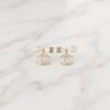Luxury_jewelry_product_image_2K_202608031901 Bow-Topped Monogram Drop Earrings ( Chenal )