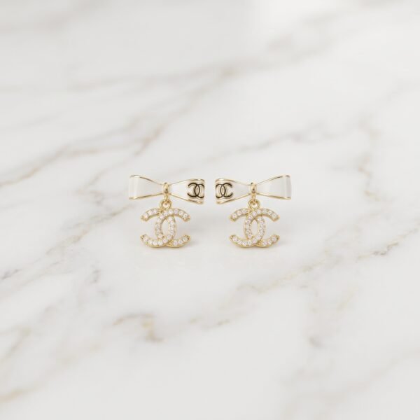 Luxury_jewelry_product_image_2K_202608031901 Bow-Topped Monogram Drop Earrings ( Chenal )