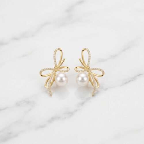 Luxury_jewelry_product_image_2K_202608031933 Golden Bow-Tie & Pearl Drop Earrings