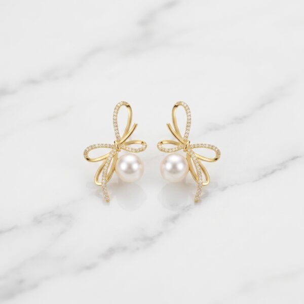 Luxury_jewelry_product_image_2K_202608031933 Golden Bow-Tie & Pearl Drop Earrings